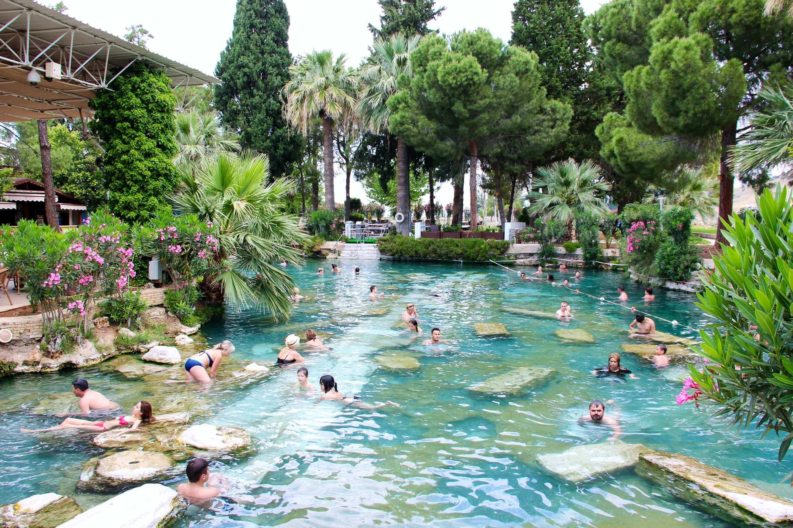 Visitors swimming in Cleopatra’s Pool