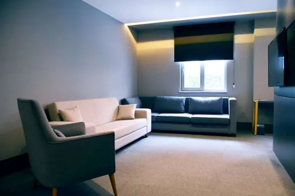 King Suite sitting area: sofa and armchair