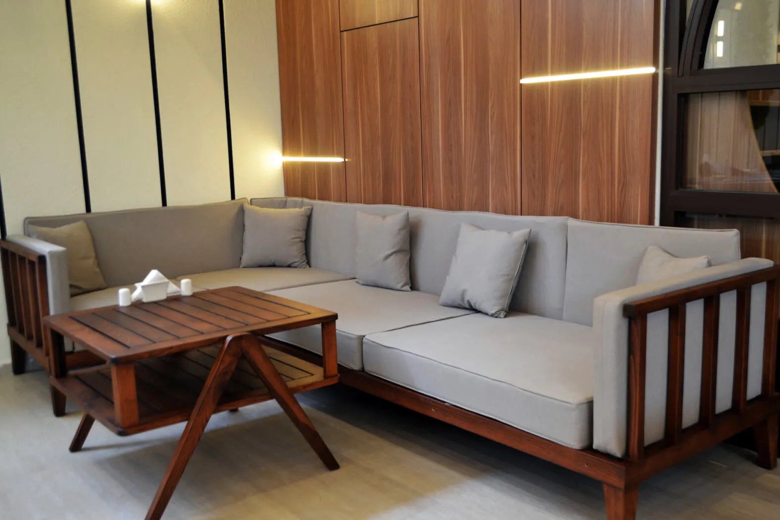 Wooden sofa and coffee table in the restaurant