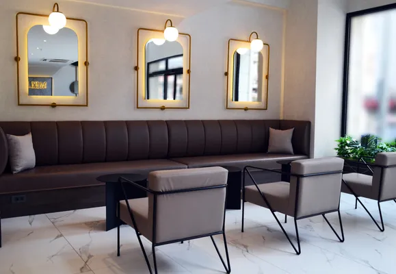 Leather sofa and armchairs in the common area